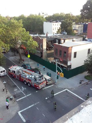 A neighbor's-eye view of the building collapse yesterday evening on Tompkins Avenue.